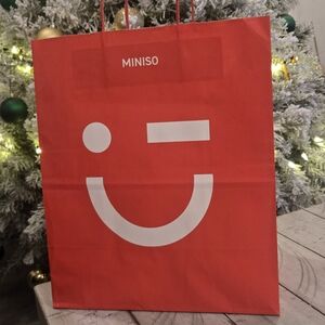 Miniso: Red Shopping Bag.